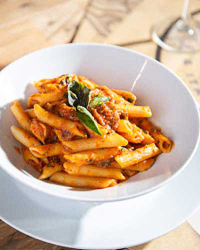 freshly baked pastas in a plate served at The Village Fish Bar Neilston