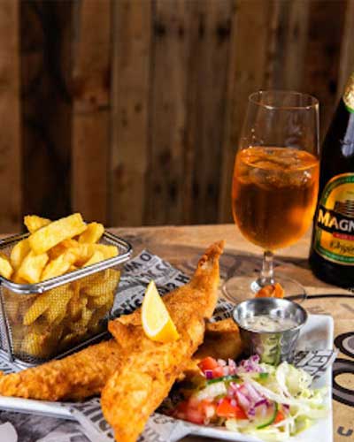 Crispy Fish & Chips served at The Village Fish Bar Neilston